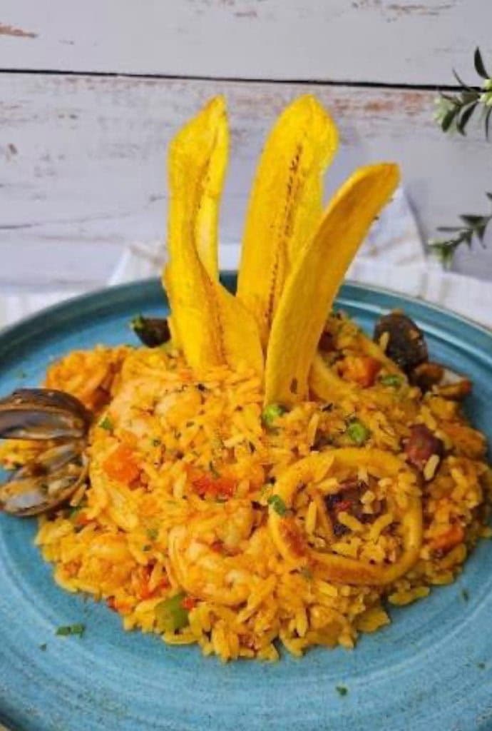Seafood rice with fried plantains